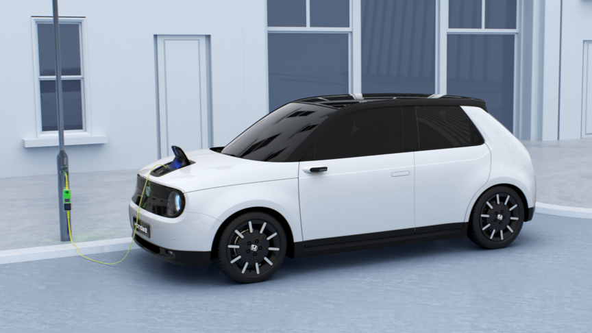 K&eacute;p egy t&ouml;ltődő Honda e aut&oacute; bal oldal&aacute;r&oacute;l