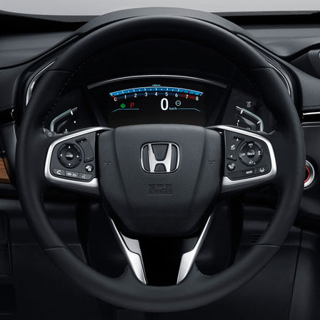 Közelkép a Honda CR-V többfunkciós kormánykerekéről.