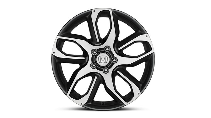 Közelkép a Honda CR-V 19 colos Rombo Silver betétekkel ellátott könnyűfém felnikről. 