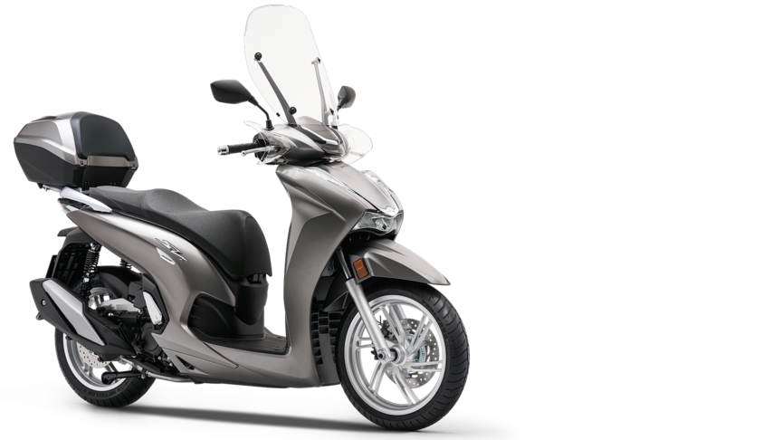 Honda SH300i elölről, túradobozzal, túraplexivel, háromnegyedes nézetben.