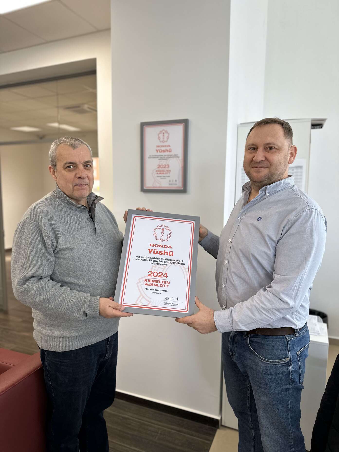 Honda dealership with Yushu award.